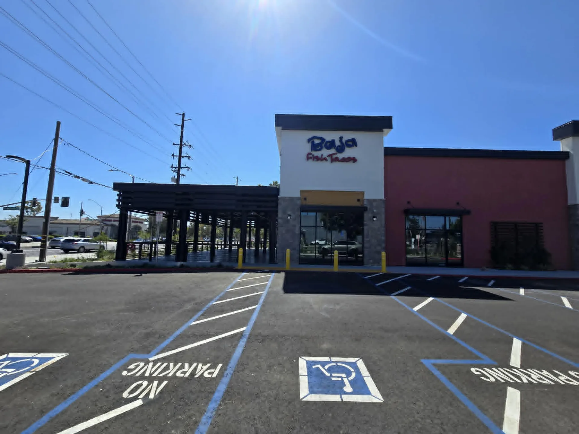 Baja Fish Tacos - Completed 2026, Santa Ana CA, exterior view of the new 2-unit restaurant building with covered patio and signage